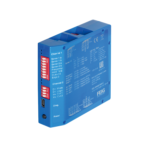blue plastic V.E.K loop detector with several DIP switches